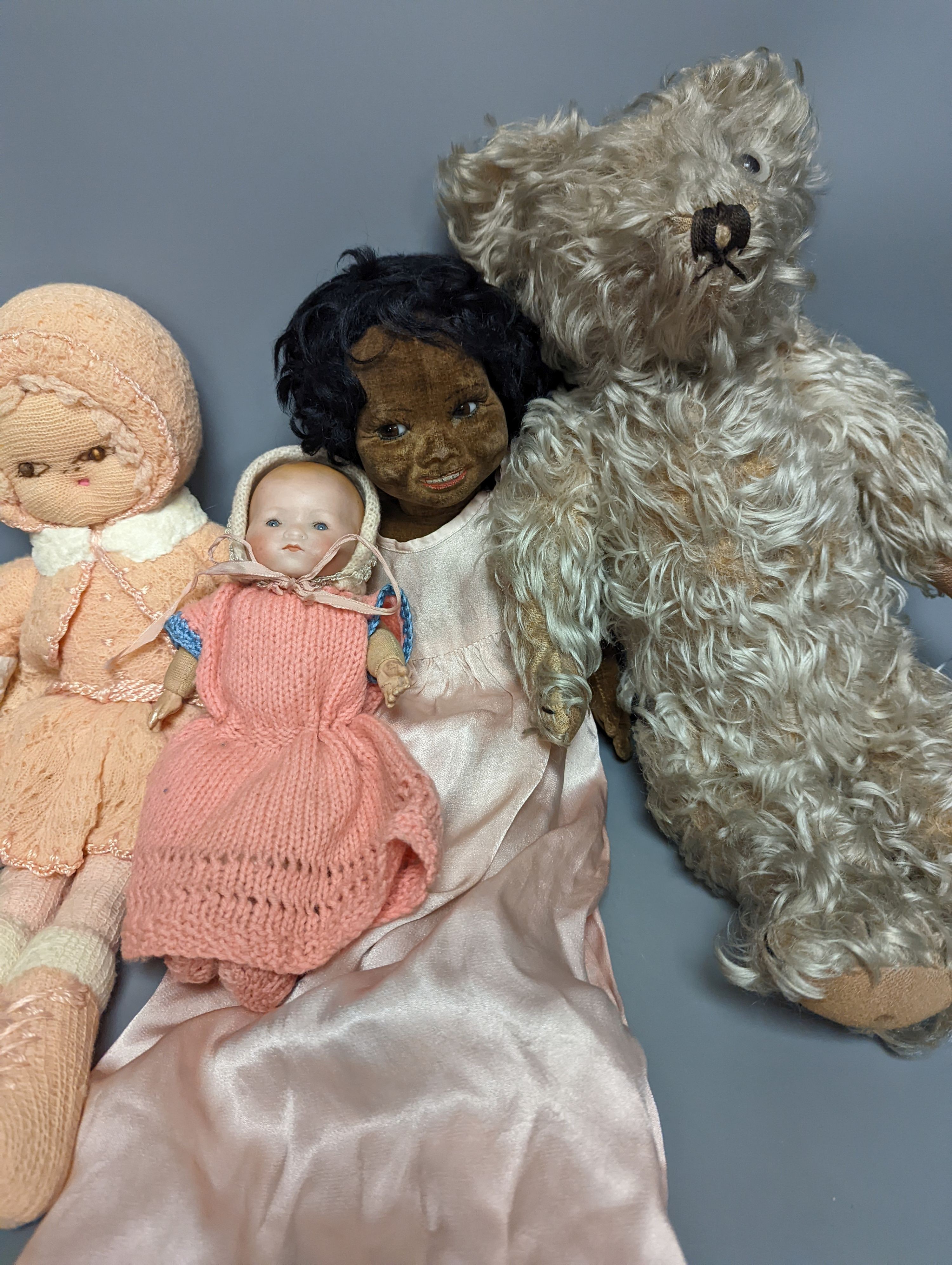 A Nora Wellings type mulatto doll and an Armmand Marseille doll 341, teddy etc, mulatto doll 43cms high